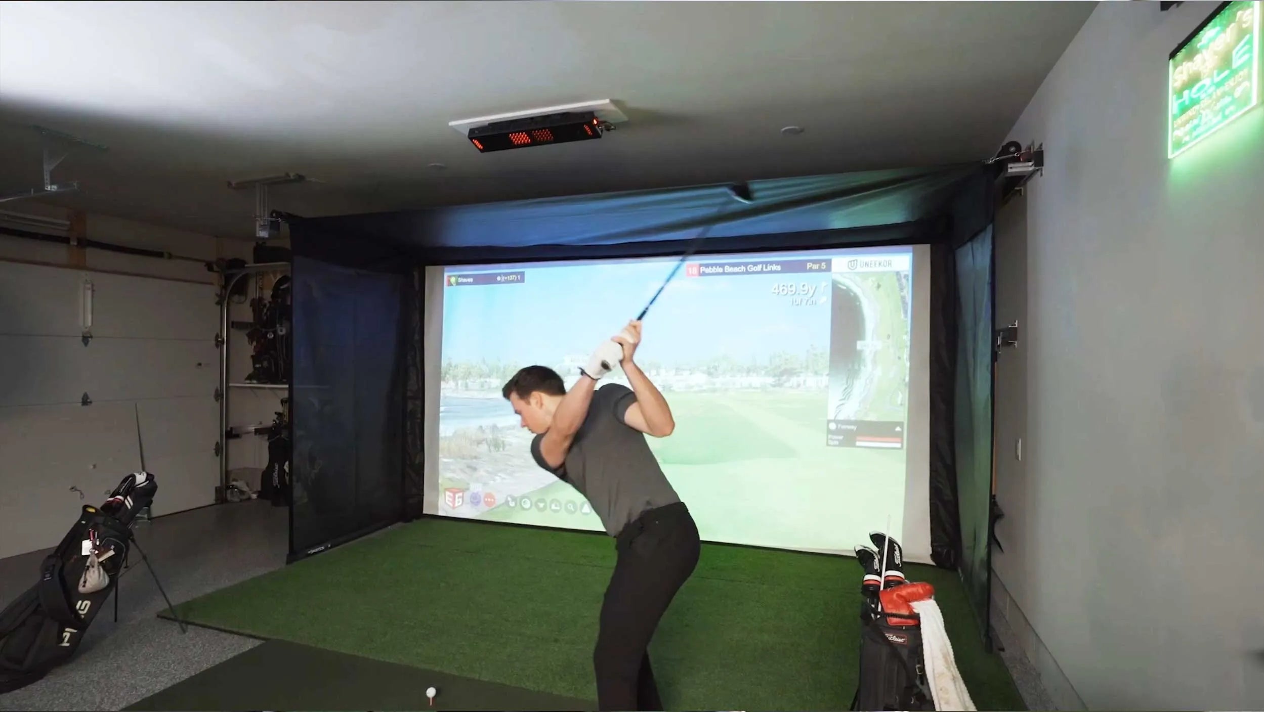 The SportScreen Vanish 16 Golf Simulator Enclosure (Hand Crank + Premium 3 Ply Impact Screen)